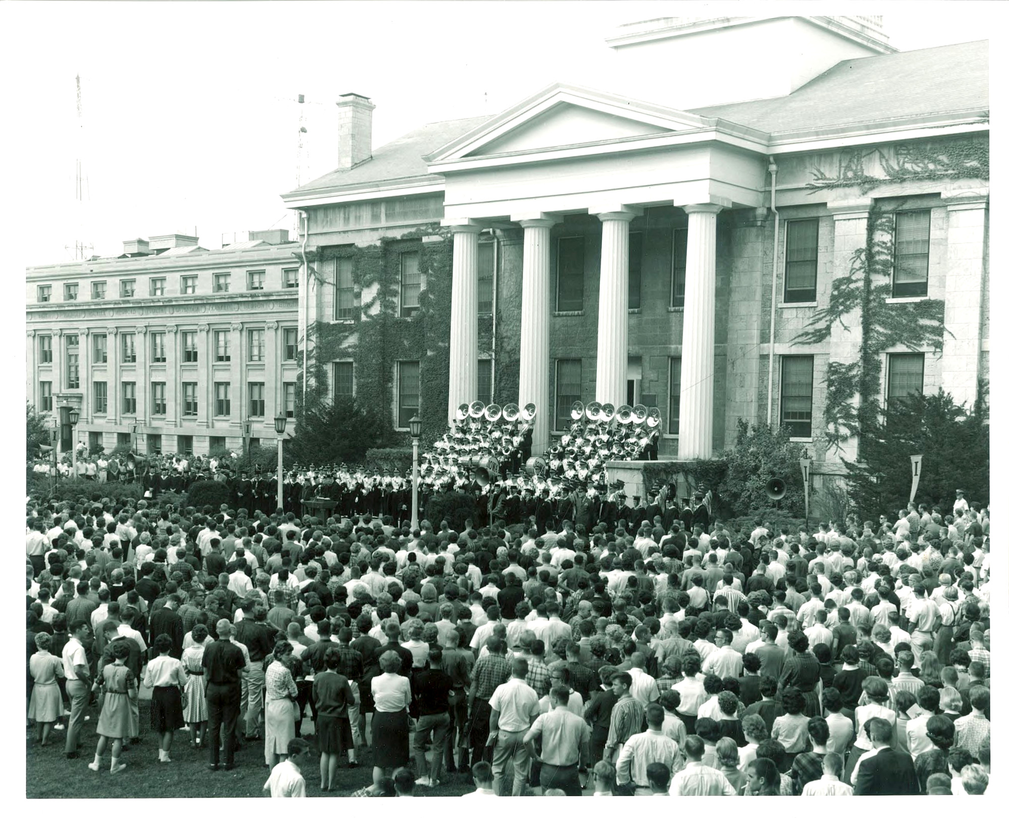 A brass band playing on the east steps of Old Capitol in 1965